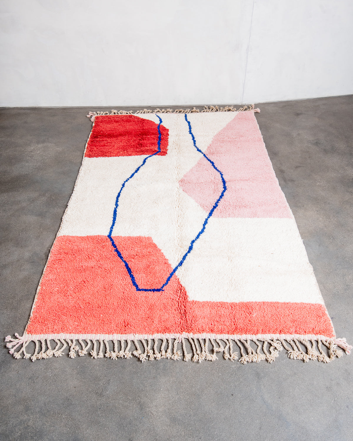 Modern, designer, handcrafted Berber rug from Morocco. Beniourain carpet with beautiful colours and patterns and fluffy wool texture.